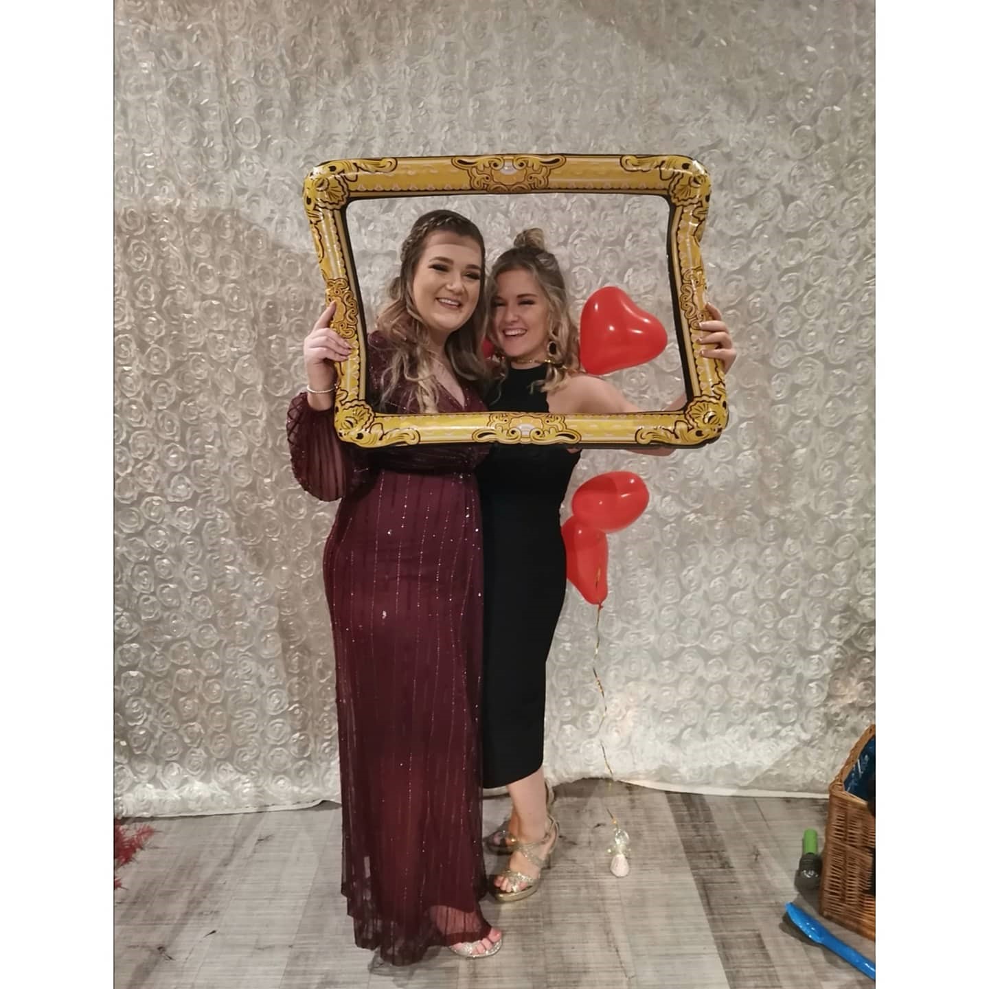 Photo of Amy and Charlotte posing for a photo at an event