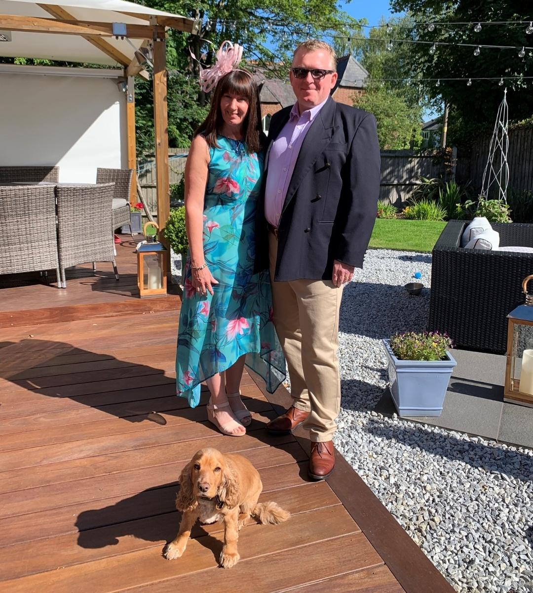 Tim, his wife Maria and their spaniel Charlie.