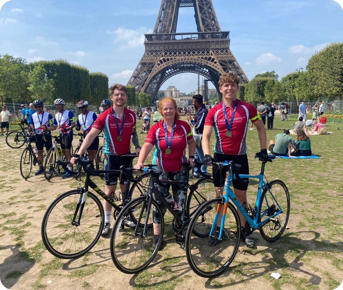 Kyren, James and Lewis in front of the Eiffel Tower after completing the London to Paris Cycle