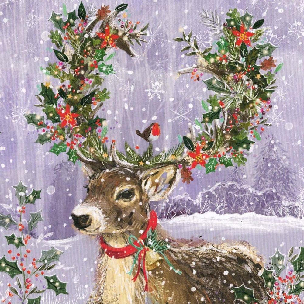 Christmas card featuring a reindeer with decorated antlers