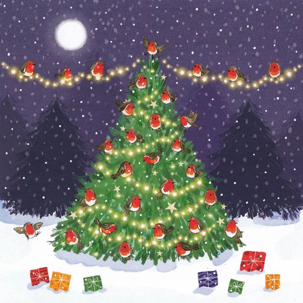 Christmas card featuring a Christmas tree in snow