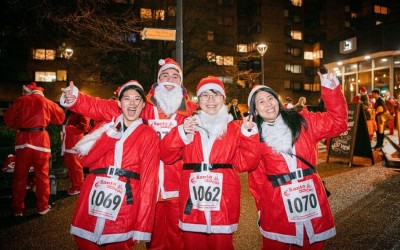 Runners in their Santa suits